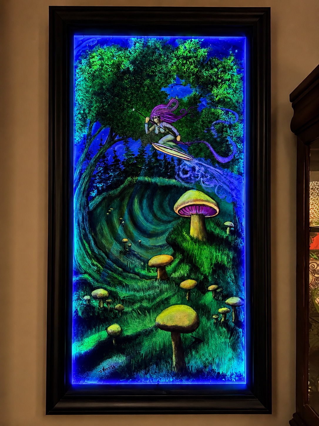 Tall glowing fantasy artwork in a handcrafted black frame