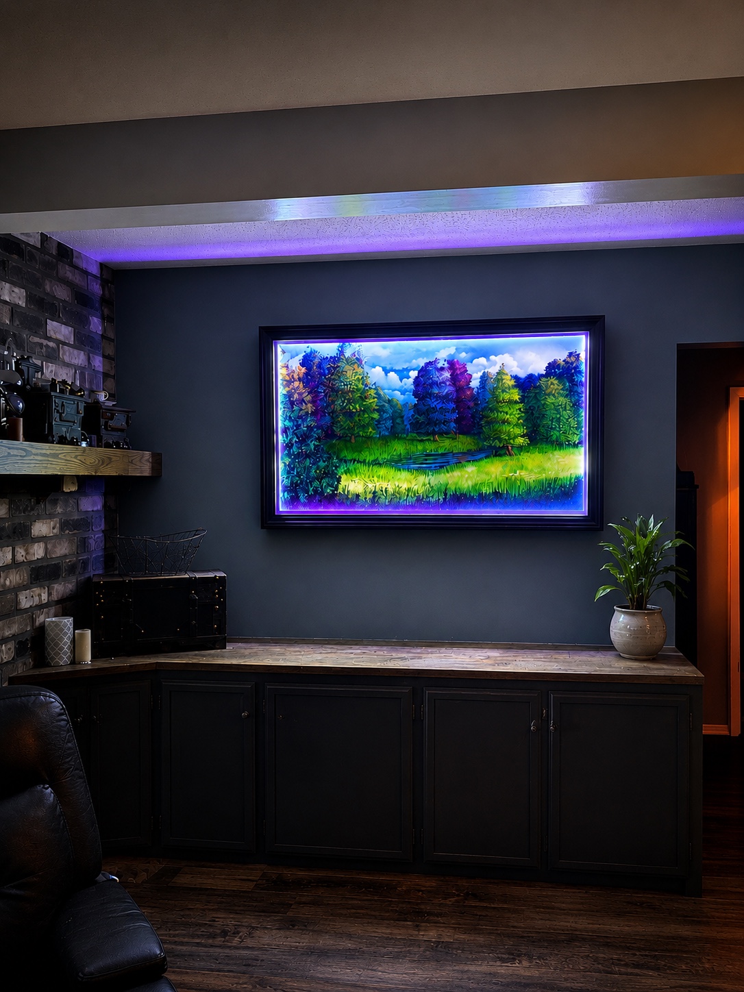Wide glowing landscape frame installed in a finished room